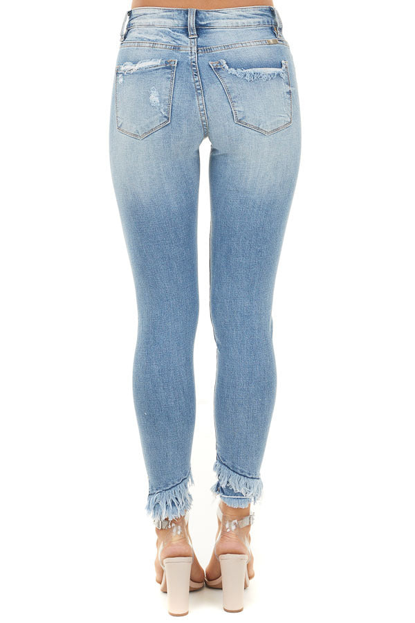 Medium Wash Distressed Mid Rise Skinny Jeans with Frayed Hem