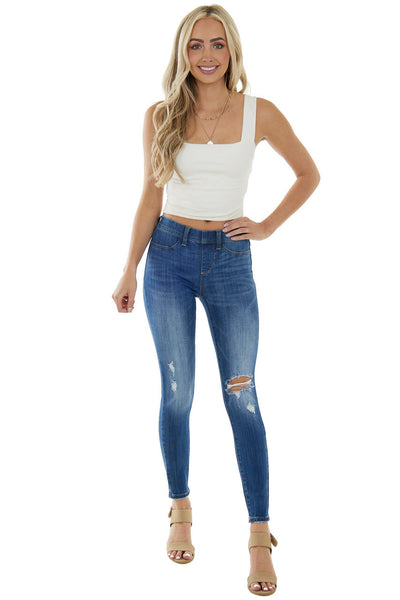 Medium Wash Mid Rise Distressed Knee Jeggings