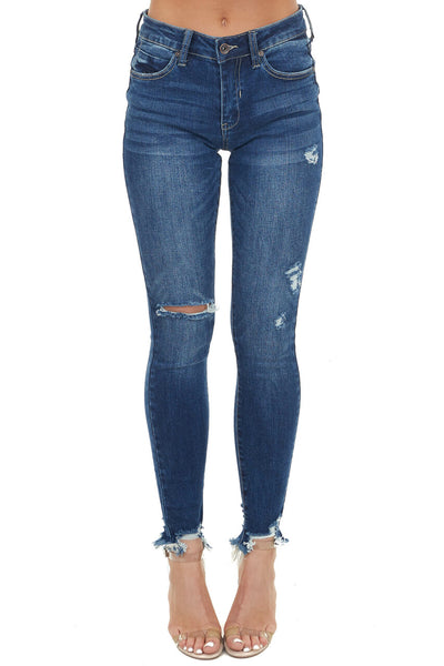 Medium Wash Mid Rise Skinny Jean with Distressed Details