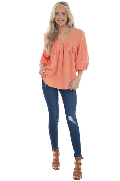 Vivid Salmon Textured V Neck Babydoll Top